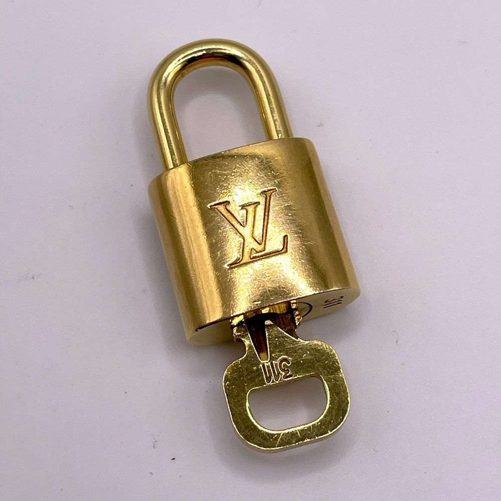 100% Authentic and pre loved Louis Vuitton - Gold Lock and Key set #311
